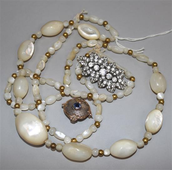 Two brooches & a necklace.